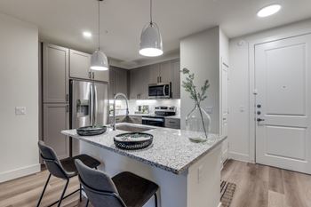 Granite countertops with under-mount stainless single bowl sink